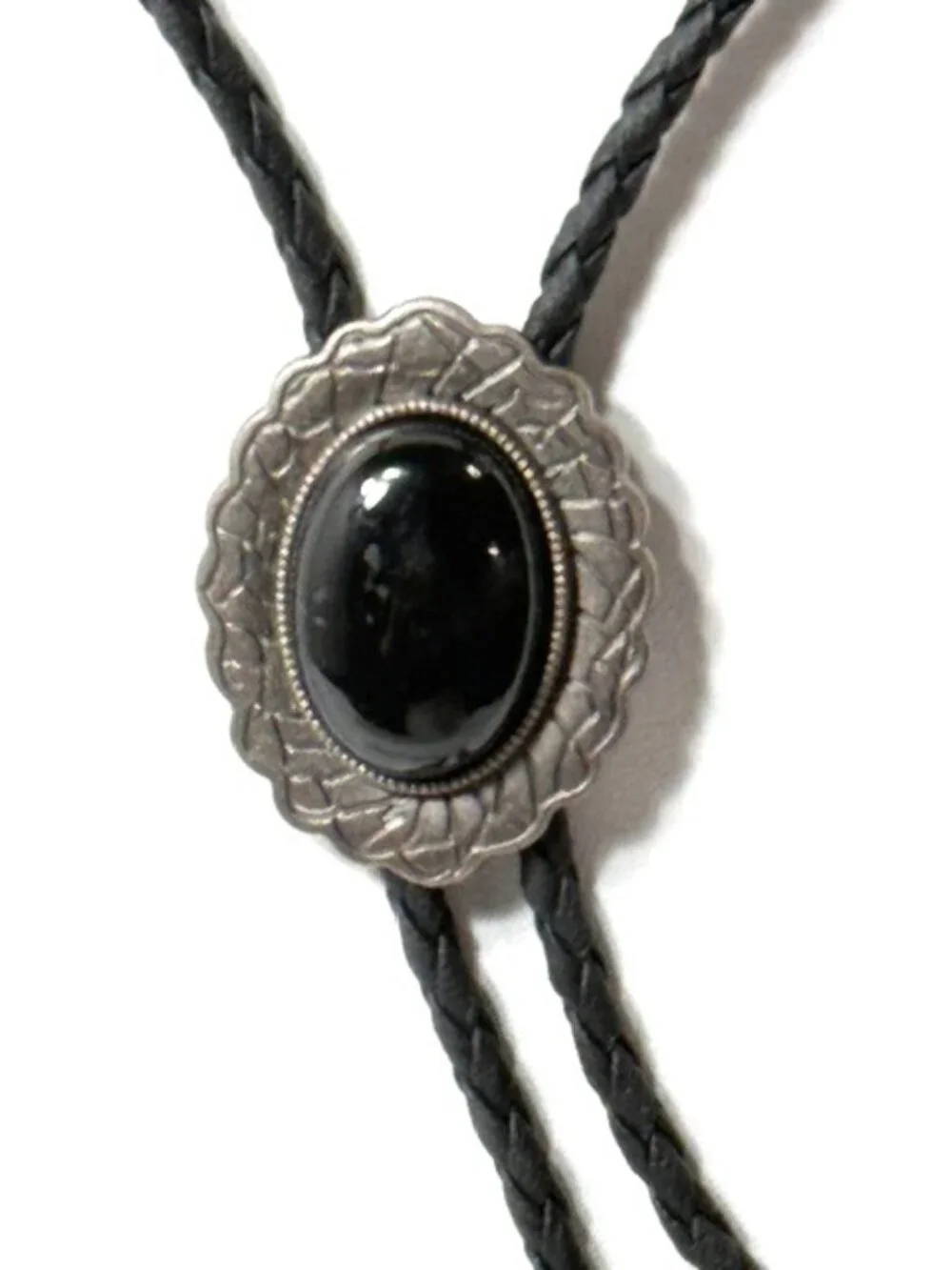 Pewter-tone, black stone, black cord western cowboy bolo tie.